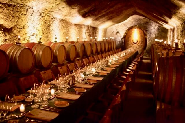 team dinner in wine cellar