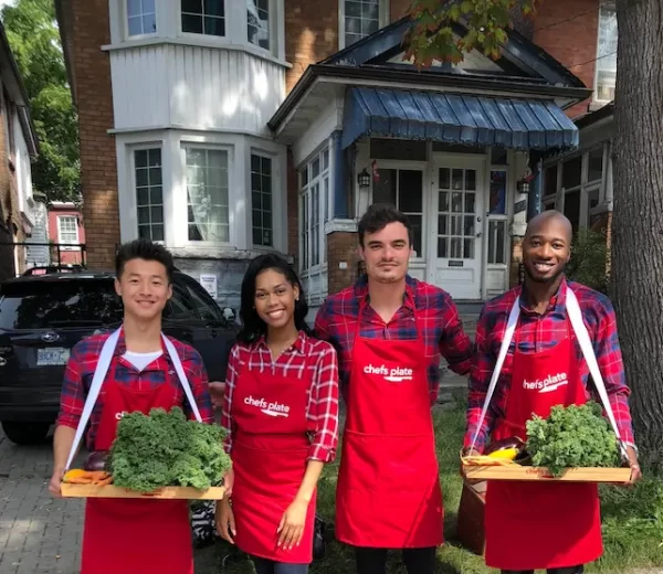 Experiential marketing street team in Toronto handing out fresh ingredients during a neighbourhood brand activation